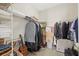 Walk-in closet features built in shelving for optimal storage and organization, perfect for maximizing space at 5194 Layton Dr, Venice, FL 34293