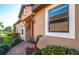 Inviting front entrance with a well-manicured lawn and lush landscaping at 5505 Cantucci St, Nokomis, FL 34275