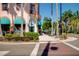 Sidewalk view, featuring lush landscaping and colorful street sculptures at 5800 Niblick Pl, North Port, FL 34287