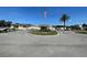 Well maintained clubhouse with circle drive, flagpole and tropical landscaping welcomes you to this great community at 6665 Keystone Ct, North Port, FL 34287