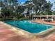 Enjoy a relaxing swim in this community pool with plenty of room for everyone to spread out at 6665 Keystone Ct, North Port, FL 34287