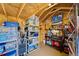 Shed interior with shelving, tools, and storage solutions for organization and convenience at 6665 Keystone Ct, North Port, FL 34287