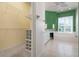 Bathroom view showing walk-in closet and a large soaking tub at 707 Petrel Way, Venice, FL 34285