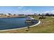 A waterfront community with docks and boats on a sunny day at 718 S Green Cir, Venice, FL 34285