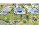 Expansive aerial view of a home featuring a private pool, spa, and meticulously landscaped yard at 8 Bunker Ln, Rotonda West, FL 33947
