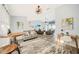 Cozy sitting area with lots of natural light and hardwood floors at 8 Bunker Ln, Rotonda West, FL 33947