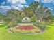 Community entrance sign: The Plantation Golf & Country Club, lush landscaping at 803 Carnoustie Dr, Venice, FL 34293