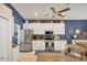 Spacious kitchen with stainless steel appliances, granite counters, and plenty of storage at 805 Derbyshire Dr, Venice, FL 34285