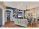 Spacious living room featuring hardwood floors and elegant furniture at 805 Derbyshire Dr, Venice, FL 34285