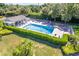 Inviting community pool area with surrounding landscaping at 811 Waterside Dr # 102, Venice, FL 34285