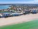 Coastal condo complex with boat docks situated near pristine sandy beaches and clear ocean waters at 995 Laguna Drive # 303, Venice, FL 34285