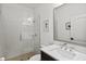 Clean, tiled bathroom with a glass shower, modern fixtures and vanity at 351 Carlino Dr, Nokomis, FL 34275