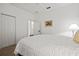 Bright bedroom with large closet and ensuite bathroom entrance at 351 Carlino Dr, Nokomis, FL 34275