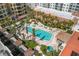 Aerial view of a beautiful outdoor swimming pool and spa at 100 Central Ave # D509, Sarasota, FL 34236