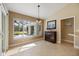 Sunny breakfast nook with large windows, neutral paint and tile floors at 1358 Ewing St, Nokomis, FL 34275