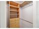 Well-organized walk-in closet with built-in shelving and drawers offering plenty of storage at 1358 Ewing St, Nokomis, FL 34275