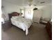 Comfortable bedroom with a double bed, soft carpet, and natural light at 210 Schooner St, North Port, FL 34287