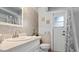 A cozy bathroom features a sink and a commode at 2537 Northway Dr, Venice, FL 34292