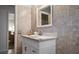 A cozy bathroom features a sink and a cabinet at 2537 Northway Dr, Venice, FL 34292