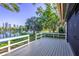 Lovely deck with a beautiful view of the pond and landscaping at 3 Inlets Blvd # 3, Nokomis, FL 34275