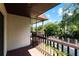 Balcony view of street with shade trees and blue sky at 3351 Ramblewood Ct # 3351, Sarasota, FL 34237