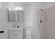 Bright bathroom featuring a tub with shower and white vanity at 3351 Ramblewood Ct # 3351, Sarasota, FL 34237