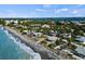 Aerial view of the beachfront property with a pin drop indicating its location at 4074 N Beach Rd, Englewood, FL 34223