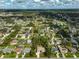 A landscape of a neighborhood and community surrounded by many trees and skies above at 4344 Ozark Ave, North Port, FL 34287