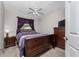 Comfortable bedroom with a plush bed, dark wood furniture, and soft lighting for a restful ambiance at 446 Pendleton Ct, Venice, FL 34292