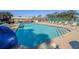 Enjoy the community pool with plenty of lounge chairs for relaxing at 446 Pendleton Ct, Venice, FL 34292