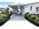 Spacious carport providing covered parking and easy access to the home's entrance at 473 Sharks Pt, North Port, FL 34287