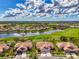 Overhead view showing the home's location on a beautiful golf course and lake at 5371 White Ibis Dr, North Port, FL 34287