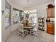 Breakfast nook with tile floor, and lots of natural light at 564 Meadow Sweet Cir, Osprey, FL 34229