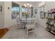 Breakfast nook features lots of natural light and tile flooring at 564 Meadow Sweet Cir, Osprey, FL 34229