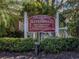 Community entrance sign for The Cottages of Rivendell with lush landscaping at 564 Meadow Sweet Cir, Osprey, FL 34229