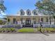 Inviting single-Gathering home with a charming white picket fence and manicured lawn at 564 Meadow Sweet Cir, Osprey, FL 34229