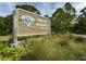 Welcoming entrance sign to Oscar Scherer State Park surrounded by lush greenery and landscaping at 564 Meadow Sweet Cir, Osprey, FL 34229