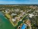 Panoramic aerial view of a waterfront community featuring canals, private docks, and beautiful coastal scenery at 641 Bayshore Rd, Nokomis, FL 34275