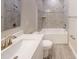 Clean bathroom with tub, shower, and updated vanity at 5113 Hablow Ln, North Port, FL 34286
