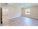 Spacious bedroom with carpet flooring and a large window at 5113 Hablow Ln, North Port, FL 34286