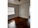 A bright bedroom featuring beautiful hardwood floors at 510 26Th St S, St Petersburg, FL 33712