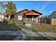 Charming bungalow featuring eye-catching two-tone colors and a cozy front porch at 510 26Th St S, St Petersburg, FL 33712