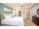 Spacious bedroom with large bed, dresser, and walk-in closet at 25503 Calusa Dr, Punta Gorda, FL 33955