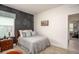 Youth bedroom with chalkboard wall and ample closet space at 25503 Calusa Dr, Punta Gorda, FL 33955