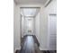 Bright entryway with wood-look flooring and an elegant door at 25503 Calusa Dr, Punta Gorda, FL 33955