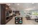 Modern kitchen with granite countertops and stainless steel appliances at 25503 Calusa Dr, Punta Gorda, FL 33955