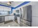 Stainless steel appliances and white shaker cabinets in this updated kitchen at 16700 Gulf Blvd # 625, North Redington Beach, FL 33708