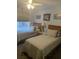 Bright bedroom featuring two twin beds and ample natural light at 7234 Cedar Hollow Cir # 7234, Bradenton, FL 34203