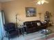 Relaxing living room with leather recliner and sofa at 7234 Cedar Hollow Cir # 7234, Bradenton, FL 34203