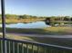 Peaceful view of pond and golf course from screened balcony at 7234 Cedar Hollow Cir # 7234, Bradenton, FL 34203